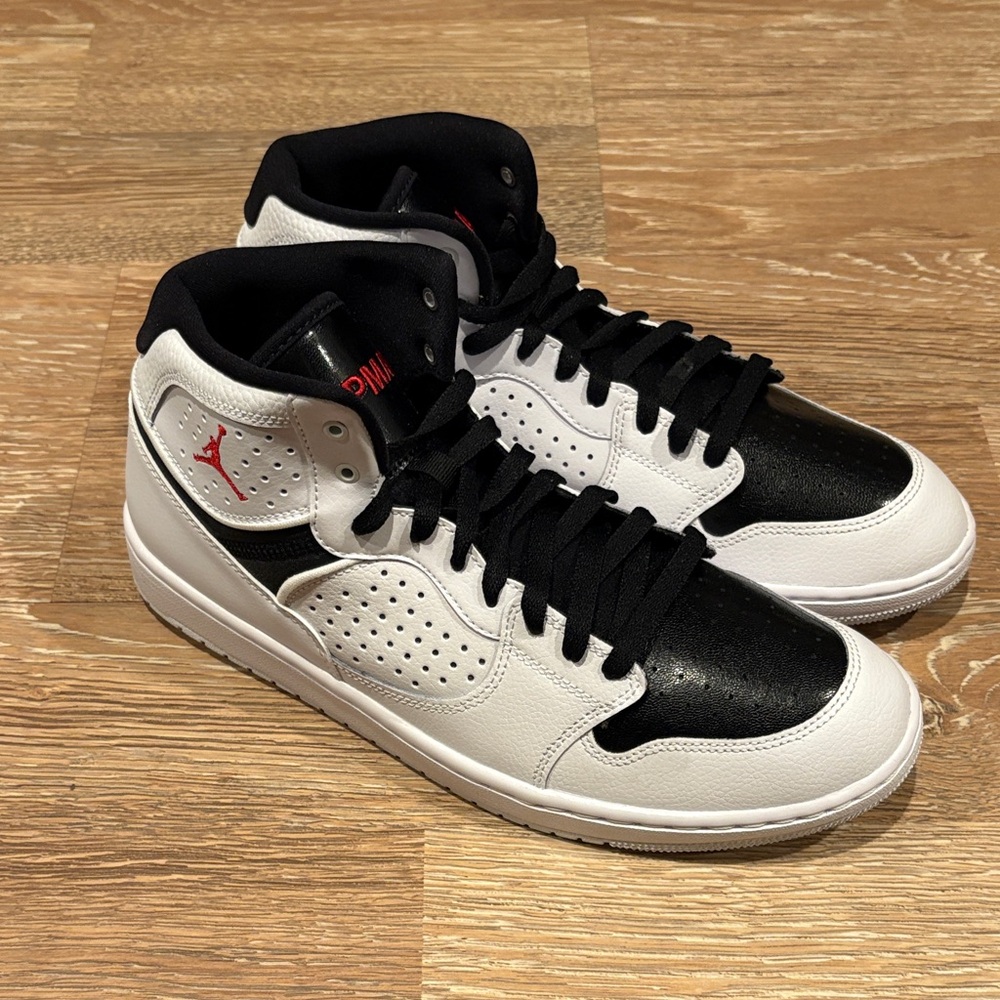 Jordan Men's Black and White High-Top Sneakers